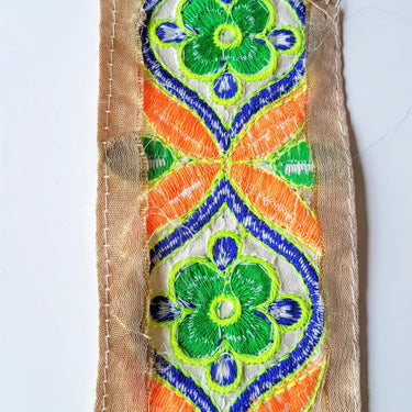 Beige Art Silk Fabric Trim With Orange, Green, Blue And Yellow Floral Embroidery